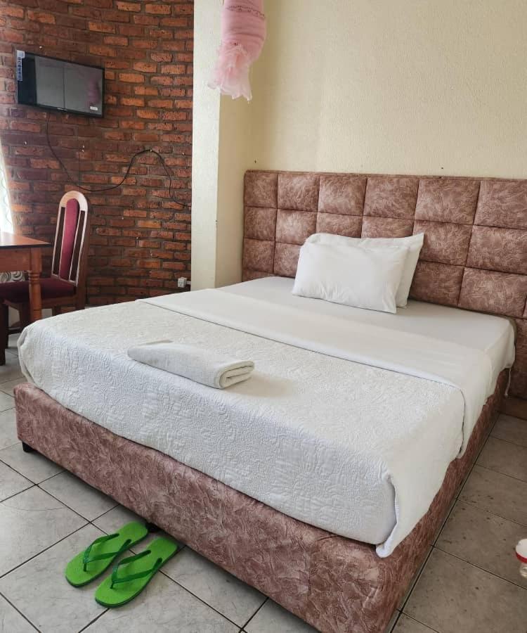 Heartland Hotel Кигали Екстериор снимка